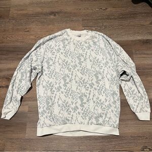 Gymshark Woman’s White and Blue Patterned Sweater with Purple Logo